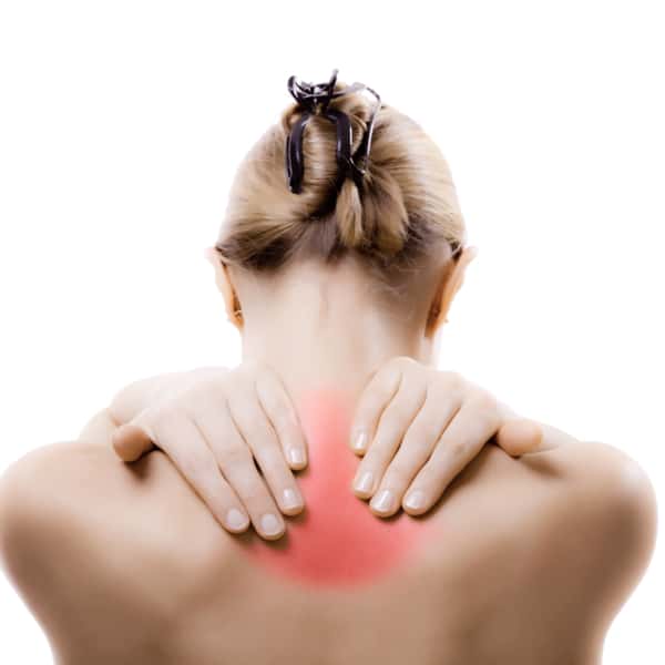Woman massaging pain neck